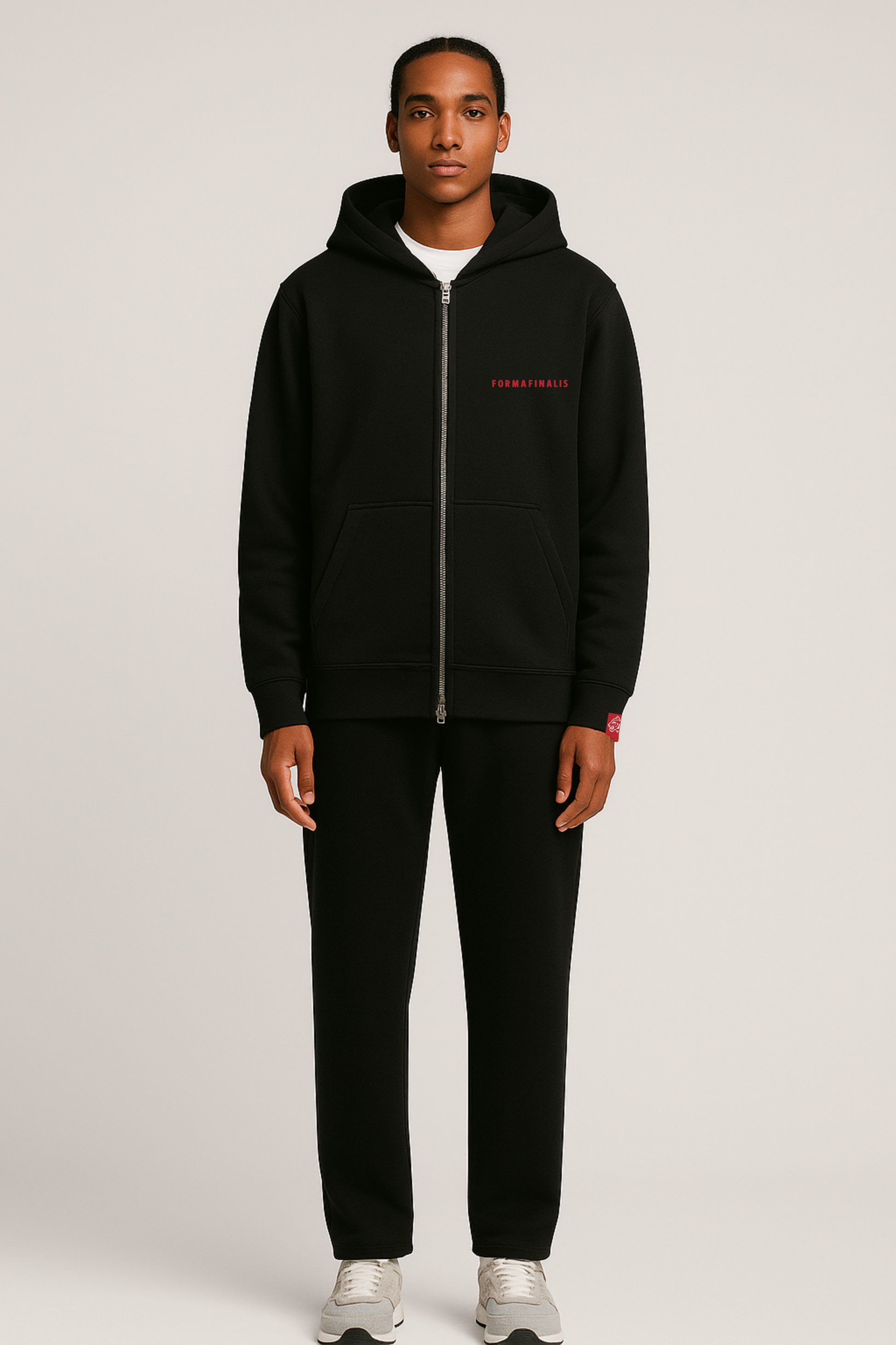 FormaFinalis FF Capsule Relaxed Cuffless Joggers in Bone, 320 GSM Cotton and Recycled Polyester, soft fleece inner lining, relaxed fit falling clean from hip to hem, with elastic waistband and tonal drawcord. Discreet FF embroided logo on front pocket.  Shown paired with FF Capsule Zip Hoodie in bone.