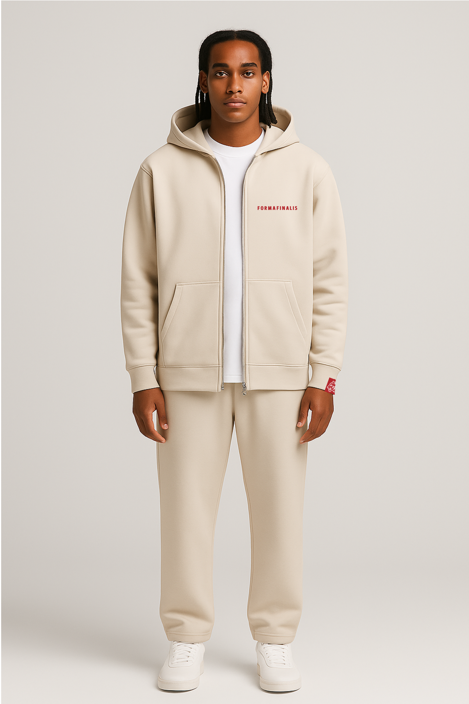 FormaFinalis FF Capsule Relaxed Cuffless Joggers in Bone, 320 GSM Cotton and Recycled Polyester, soft fleece inner lining, relaxed fit falling clean from hip to hem, with elastic waistband and tonal drawcord. Discreet FF embroided logo on front pocket.  Shown paired with FF Capsule Zip Hoodie in bone.