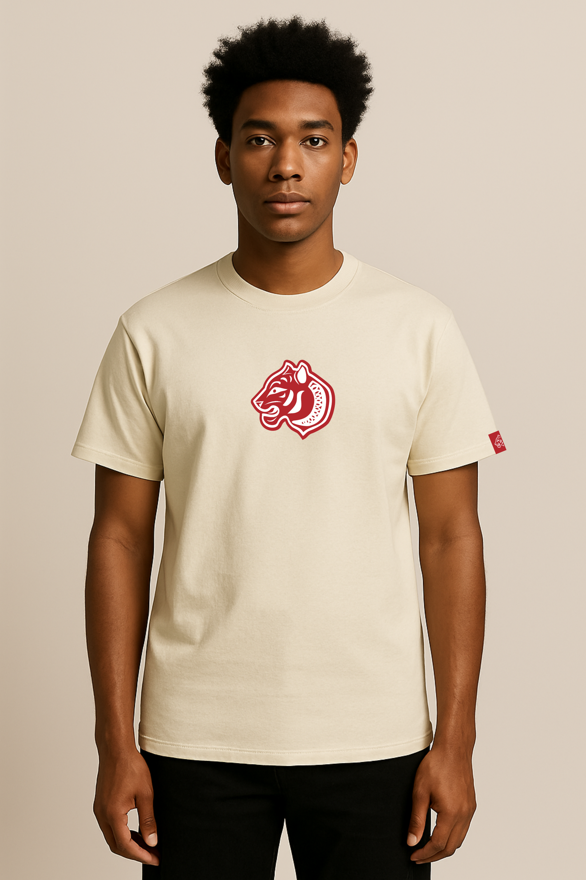 Model wearing vintage look Natural Cotton Tiger Crest Tee – tiger crest graphic motif at front.  100% Organic Cotton – Mid weight 180GSM, fits true to size - perfect for everyday movement and layering 