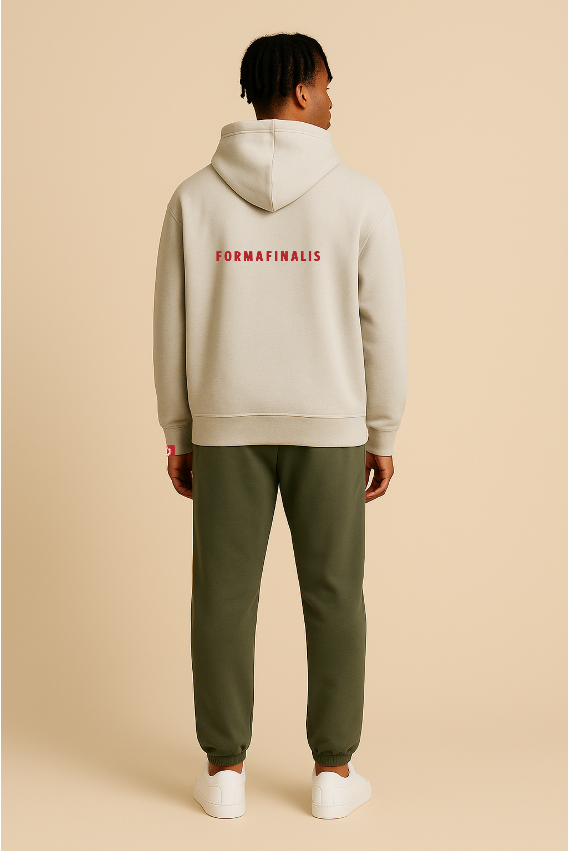 Model wears Heavy weight relaxed fit hoodie in stone.  440GSM heavy weight cotton rich with brushed fleece inner lining.  Embroidered FormaFinalis classic tiger crest front chest.  FormaFinalis word mark on back.
