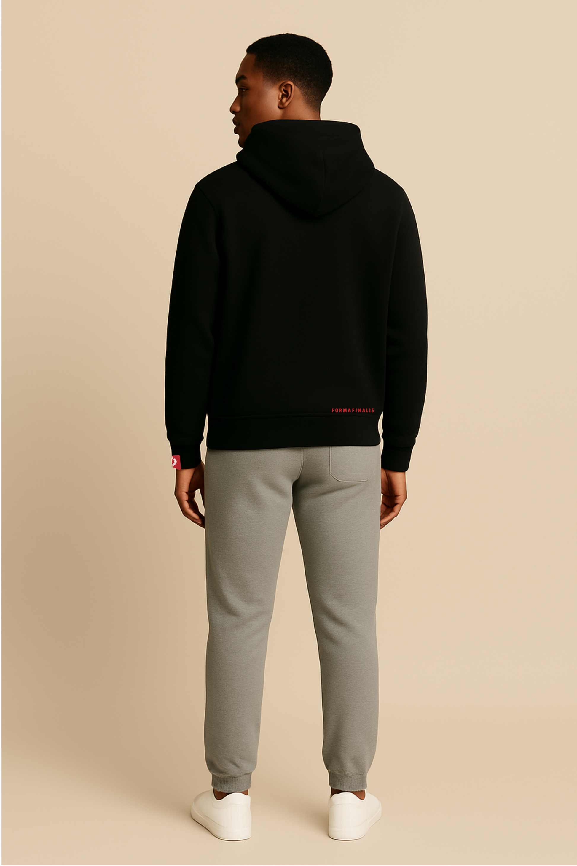 Model wears Heavy Weight Cotton Hoodie with large embroidered ornate  twin tiger motif on front, discreet FormaFinalis word mark embroidered on back.   Black hoodie with red embroidery