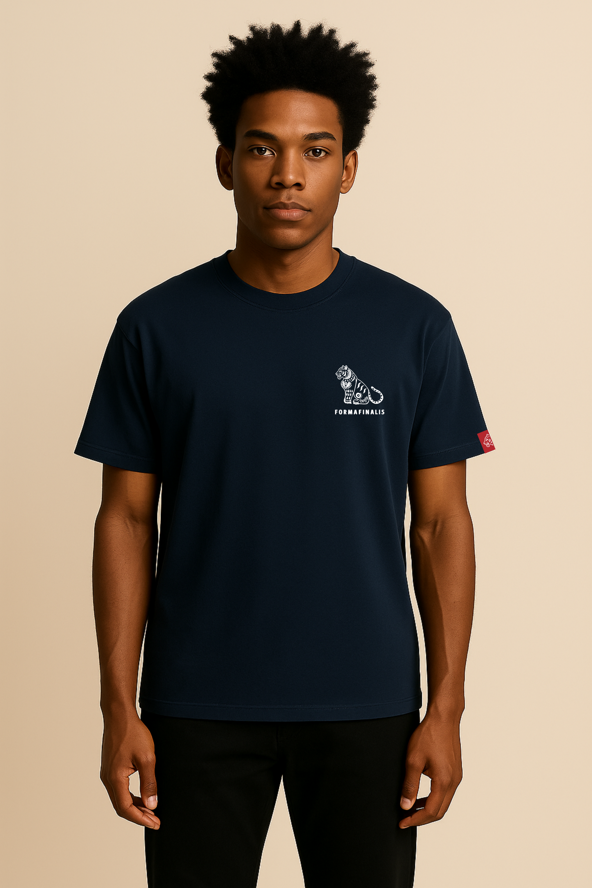 Model wears Tiger Signature Everyday Tee in French Navy.  Mid- weight 180GSM organic cotton, fits true to size.  Built for everyday comfort and movement. Ideal as a standalone or for layering.  Embroided Tiger Logo on sleeve.   Model is 6'0" and wears a size large.