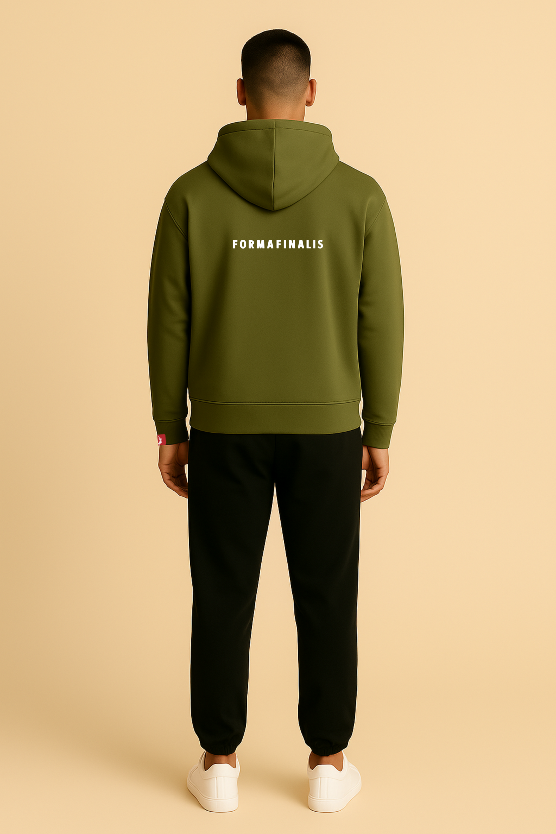 Model wears Khaki Green heavy weight oversized hoodie with a logo on the chest and FormaFinalis word-mark embroidered on back
