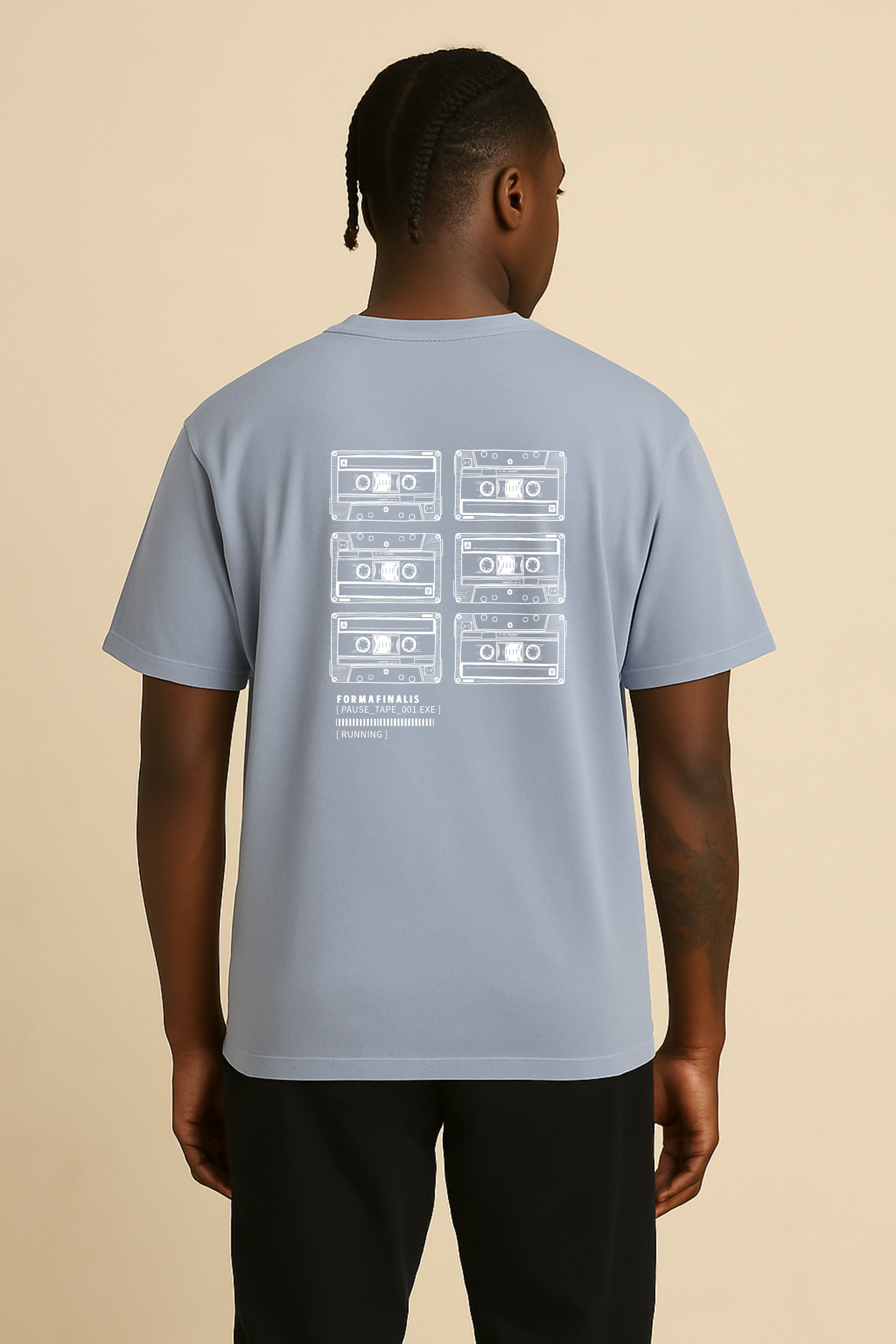 Back view – Powder Blue T-shirt with stacked cassette print honouring DIY pause tape loops on back. Heavy-weight 240gsm, 100% carded cotton, oversized fit. 
