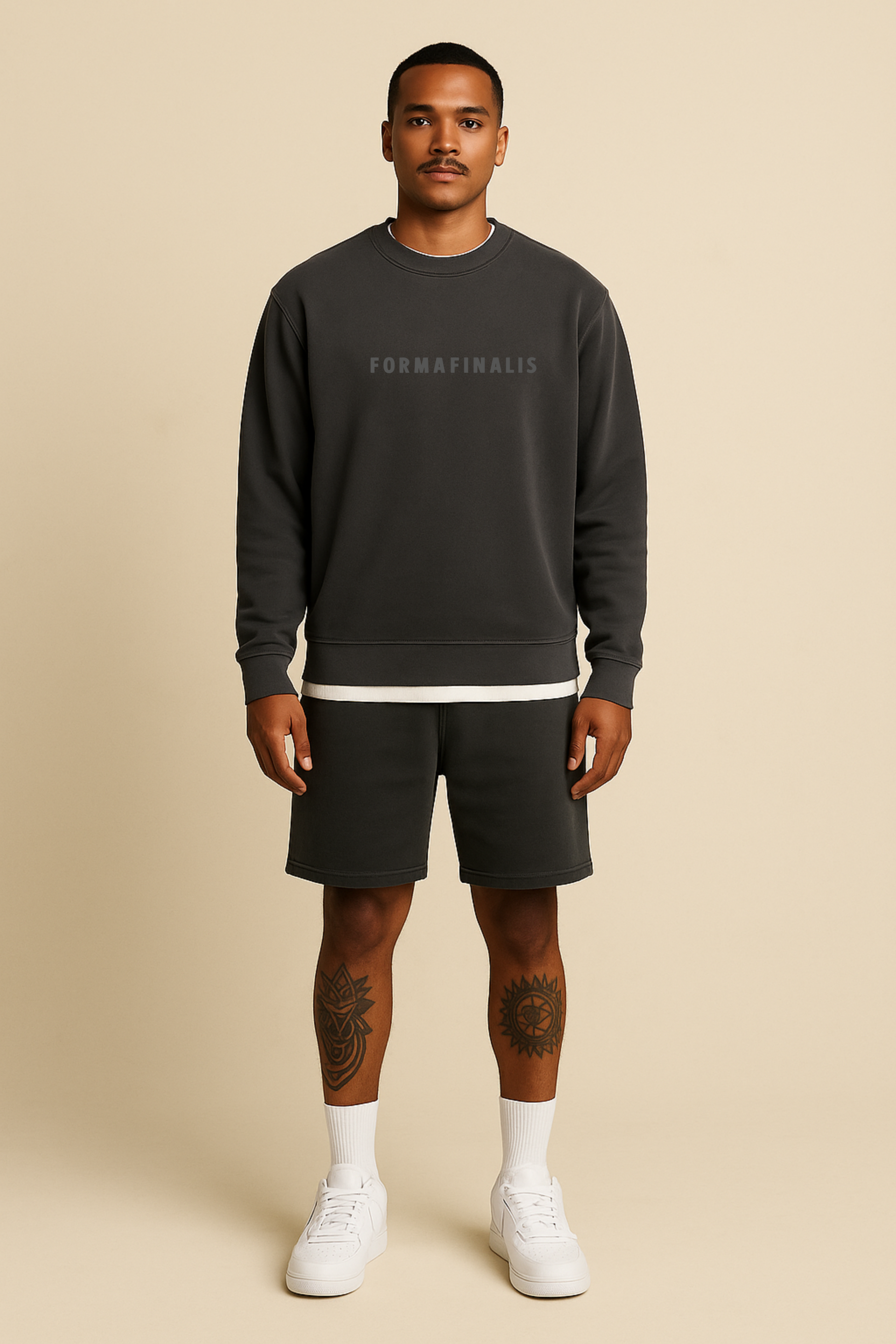 Relax Faded Track Shorts 18″ in Faded Black on model — relaxed fit, 320 GSM midweight fleece with elastic waistband. 80% Cotton 20% Recycled Polyester.  Paired with SS25 Pause Tape Relax Crew in Faded Black. 