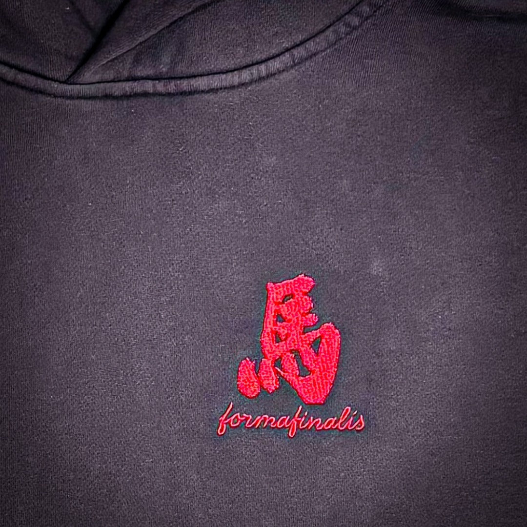 Front Identity: High-density, tactile red 馬 (Horse) embroidery—a textured sigil against the faded fleece.