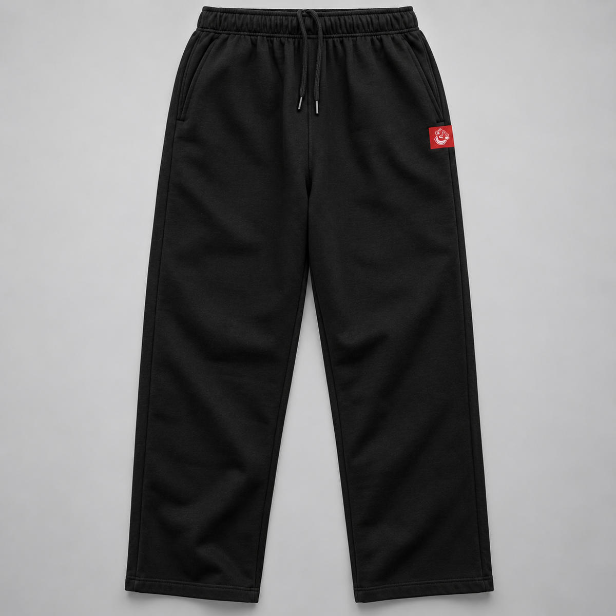 FormaFinalis FF Capsule Relaxed Cuffless Joggers in Black, 320 GSM Cotton and Recycled Polyester, soft fleece inner lining, relaxed fit falling clean from hip to hem, with elastic waistband and tonal drawcord. Discreet FF embroided logo on front pocket.  